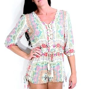 Anthropologie En Creme Floral LS Romper  Small